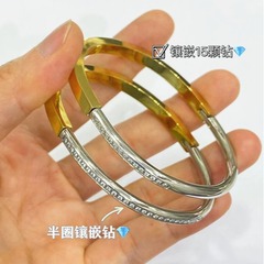 低価格の工場価格の対外貿易のアクセサリの卸売りの新型の彫刻の18kの金のチタンの鋼の女性の項の経典のフルドリルのT字の腕輪