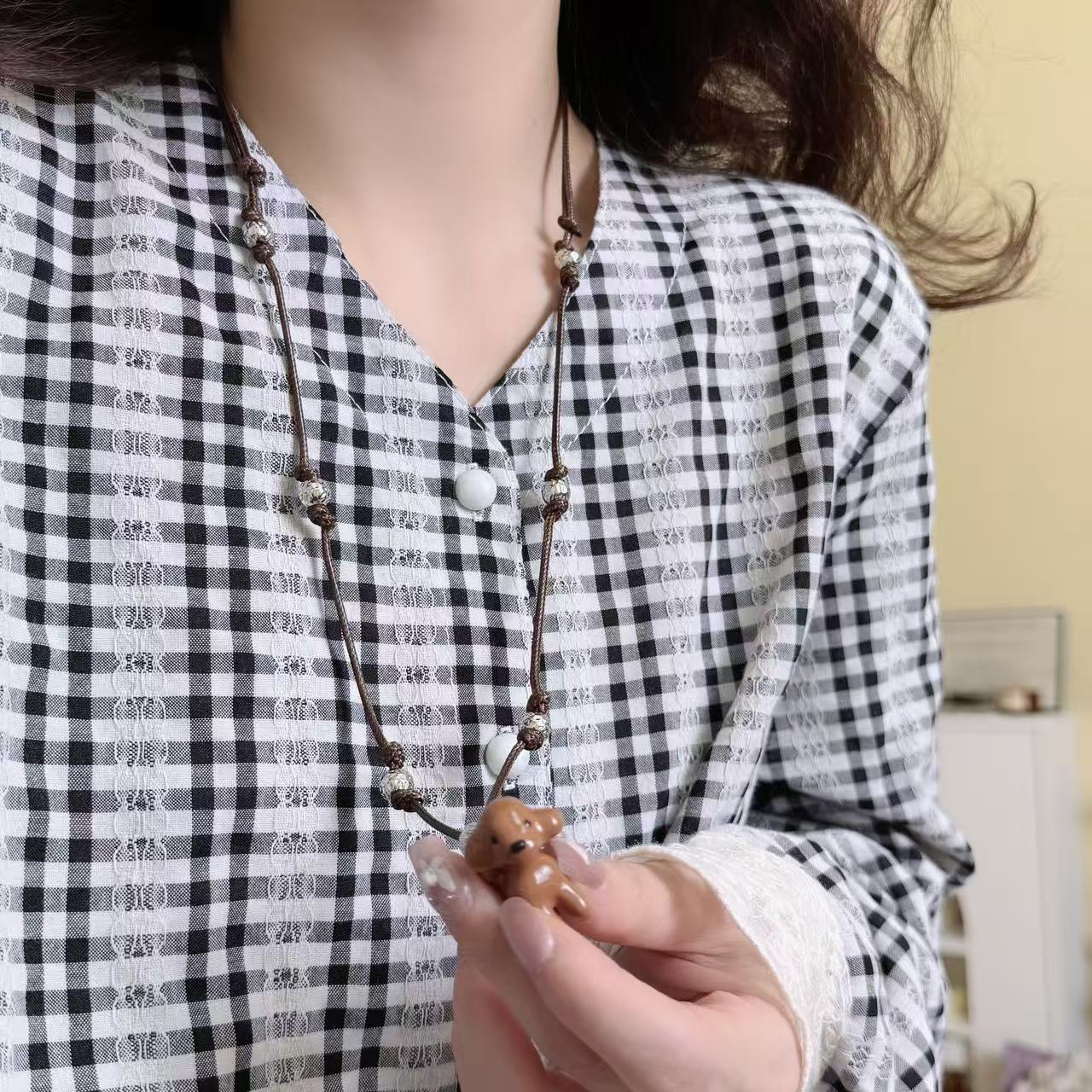 棕色滴釉泰迪狗编织绳长款项链女小众个性设计秋冬百搭毛衣链颈链