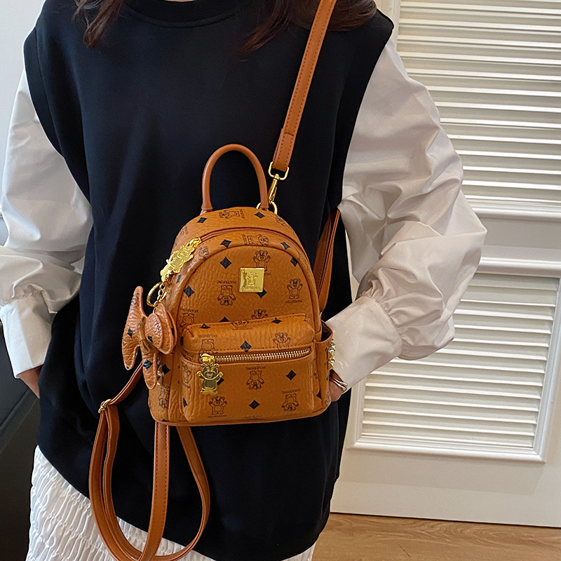 Bolsa de mujer transfronteriza de comercio exterior 2025 nuevo retro nicho bolsas escolares de estudiantes de alta calidad sensación de gran capacidad mochila de viaje