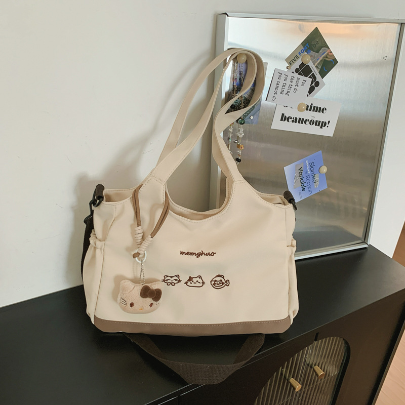 2026 nuevo lindo bolso de tote nicho de moda simple textura de viaje universal mujer gran capacidad mochila de hombro