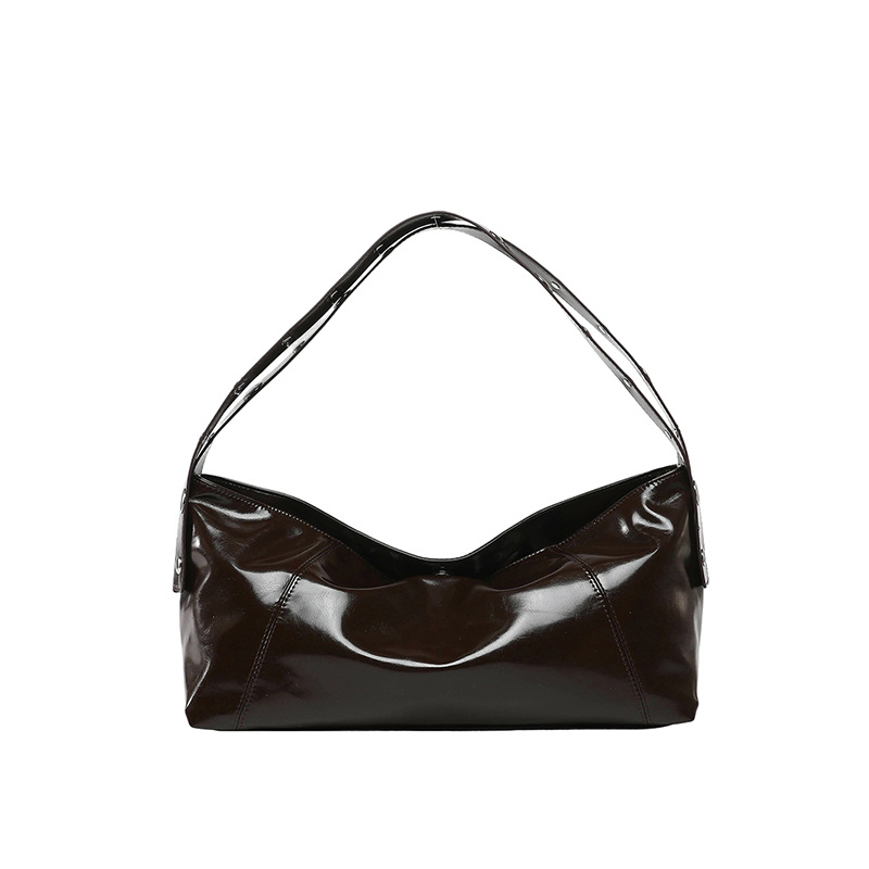 Bolso de axila retro estilo Hong Kong 2025 verano nuevo bolso femenino bolso de textura de alta calidad bolso de hombro con remaches de gran capacidad