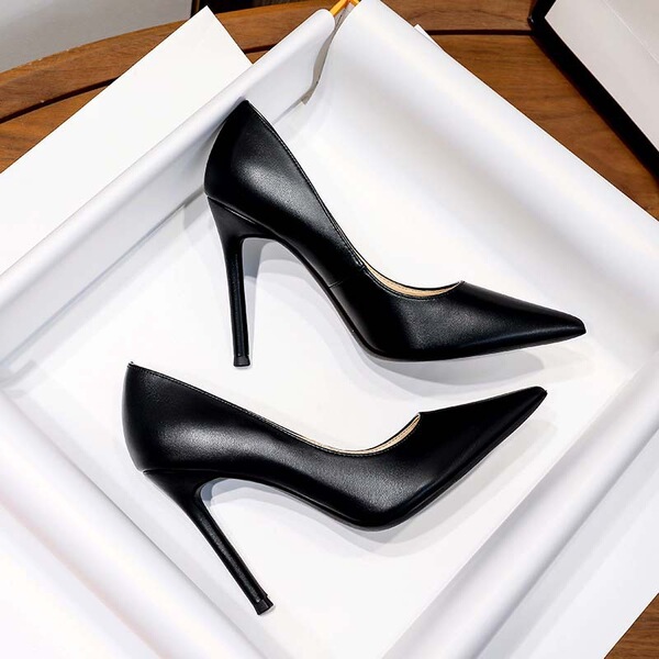 Black sexy elegant high heels made of soft leather stiletto heels…
