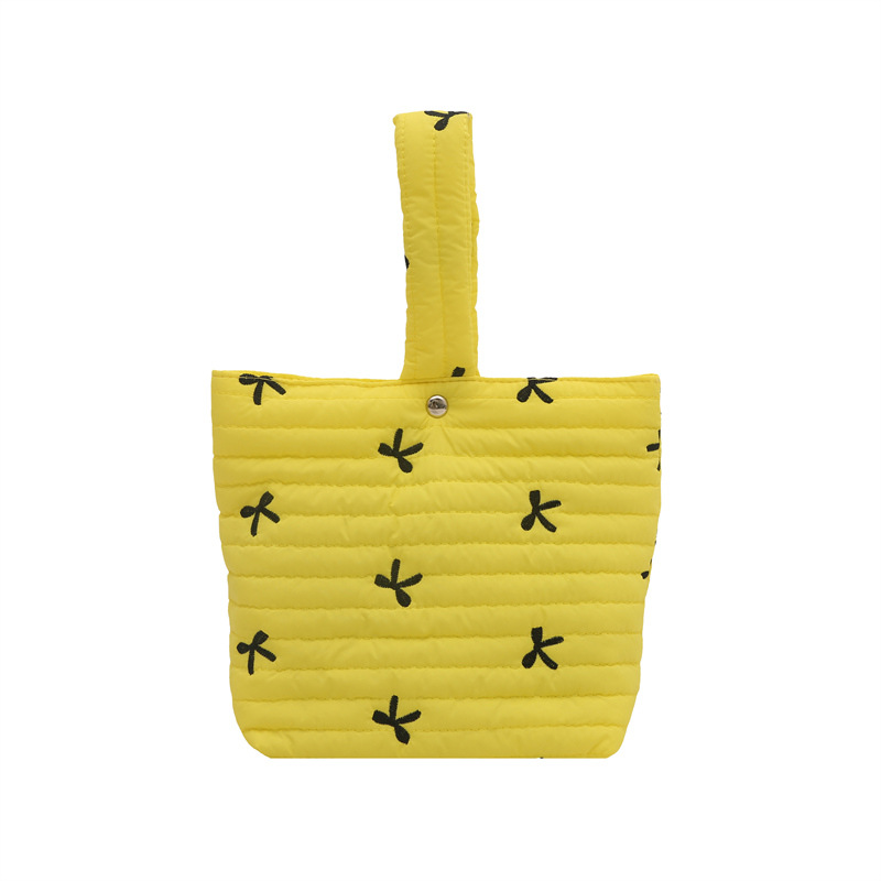 Moda coreana pequeña y fresca bolsa de bordado de arco de invierno 2024 nueva bolsa de maquillaje a rayas de diseño de nicho