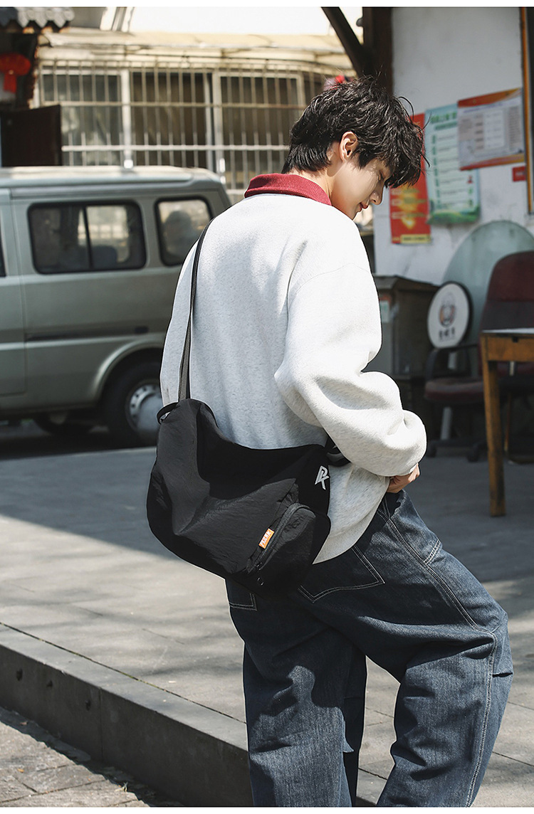Unisex casual large-capacity crossbody bag, sporty casual student backpack, fashionable and versatile commuter single-shoulder bag undefined
