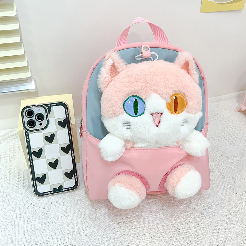 Nueva mochila de dibujos animados para niños tendencia pupila diferente gato muñeca mochila desmontable jardín de infantes en stock