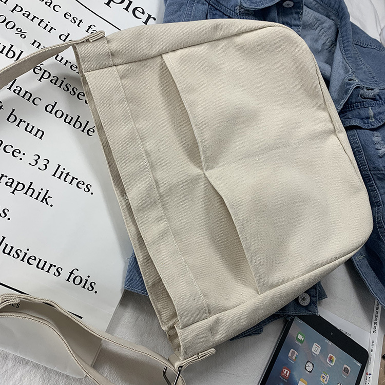 2024 nuevo estilo estilo estilo perezoso bolso de lona de mensajero de color sólido en blanco bolso escolar de estudiante bolso de hombro de estilo universitario ins