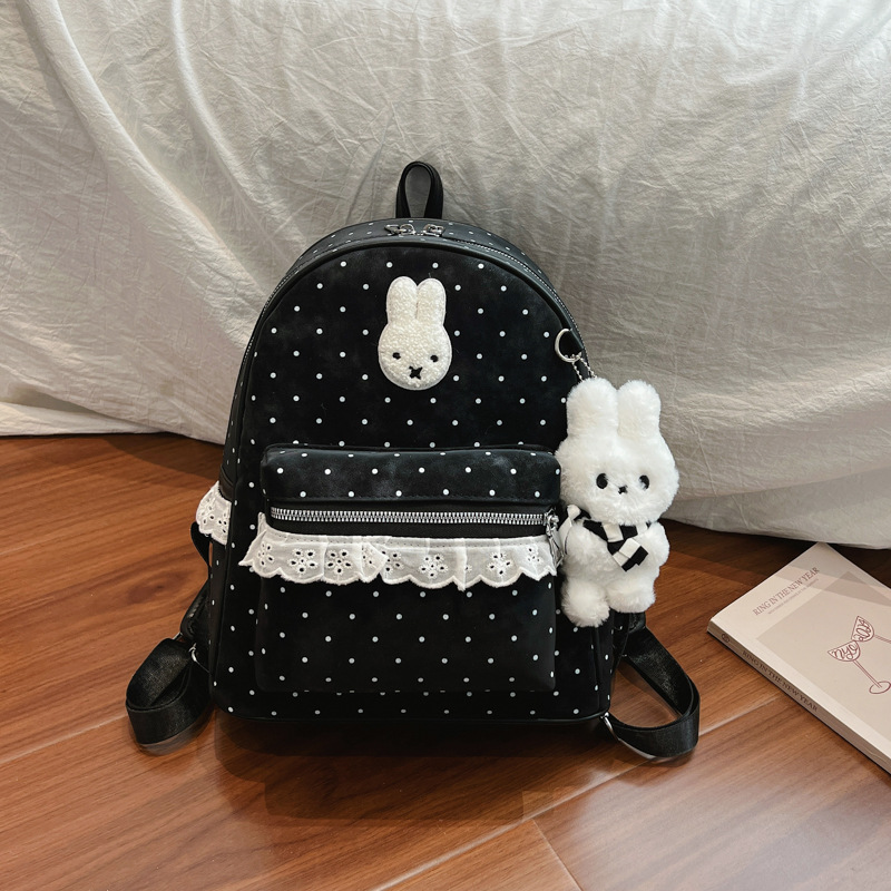 Nuevo estilo coreano dulce simple mochila pequeña mochila de conejo punto ondulado lindo mochila de alto valor de la cara fuera de la mochila de estudiantes de viaje