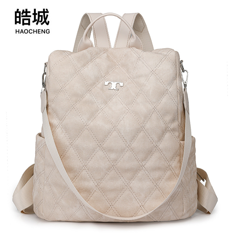 Comercio exterior al por mayor 2024 nueva mochila antirrobo simple para mujer, mochila multifuncional de doble uso para exteriores de moda