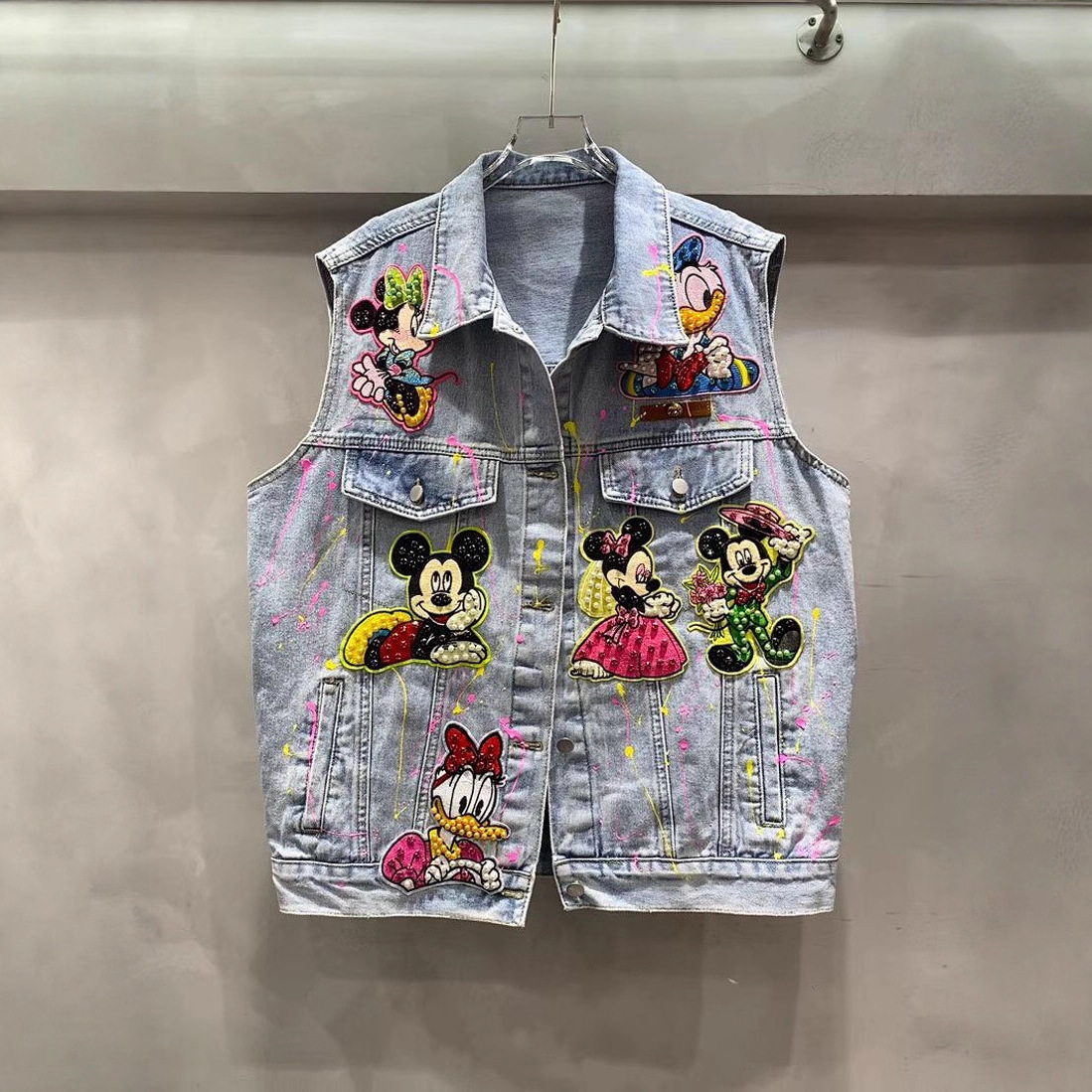 Marca de dibujos animados de marcha europea, graffiti, chaqueta de vaqueros industria pesada, chaqueta media y larga, 2026 primavera, nueva chaqueta suelta