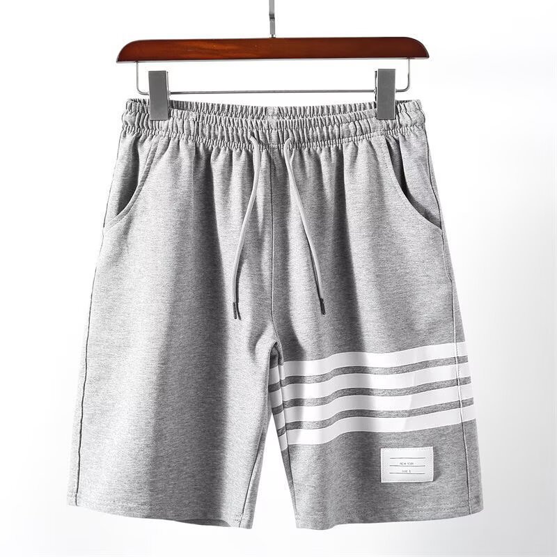 Pantalones de hombre de verano nuevos pantalones de hombre casuales transpirables pantalones cortos delgados marca de moda de tamaño grande suelto cuatro barras deportivas