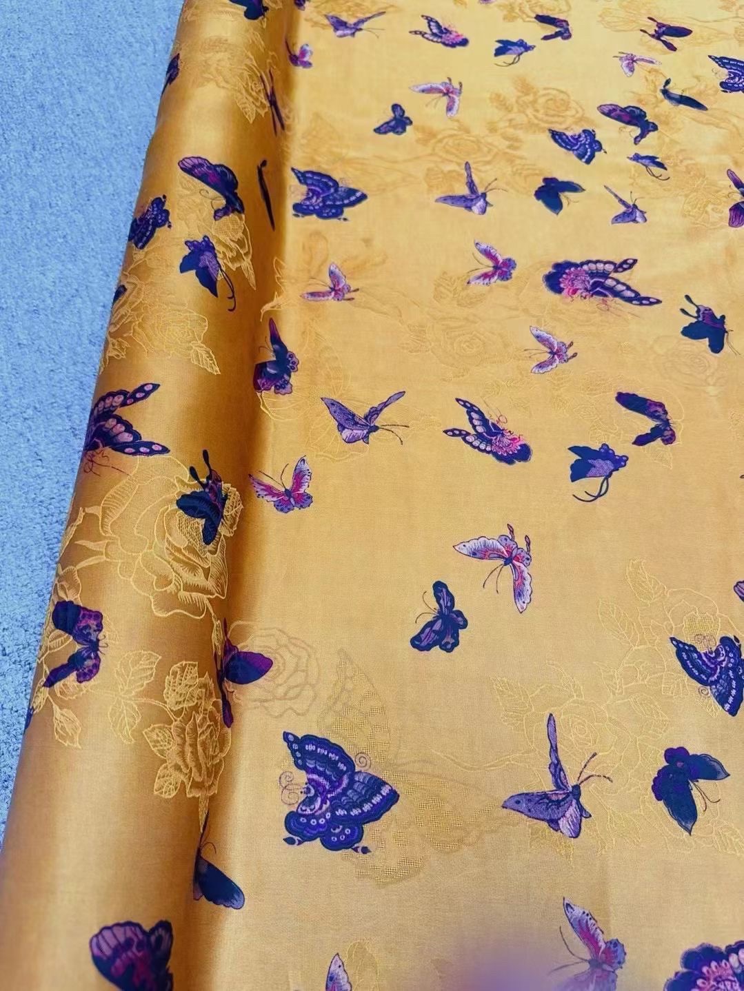Butterfly with gold background* Price per meter