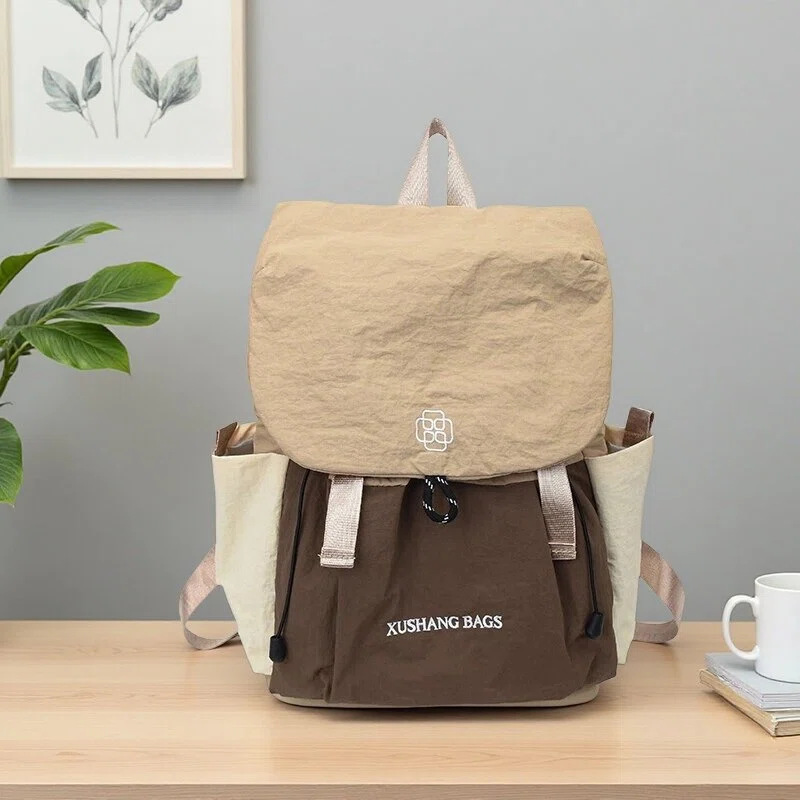 Mochila para mujeres, mochila de color ligera coreana, nicho de viaje al aire libre, mochila de montaña.