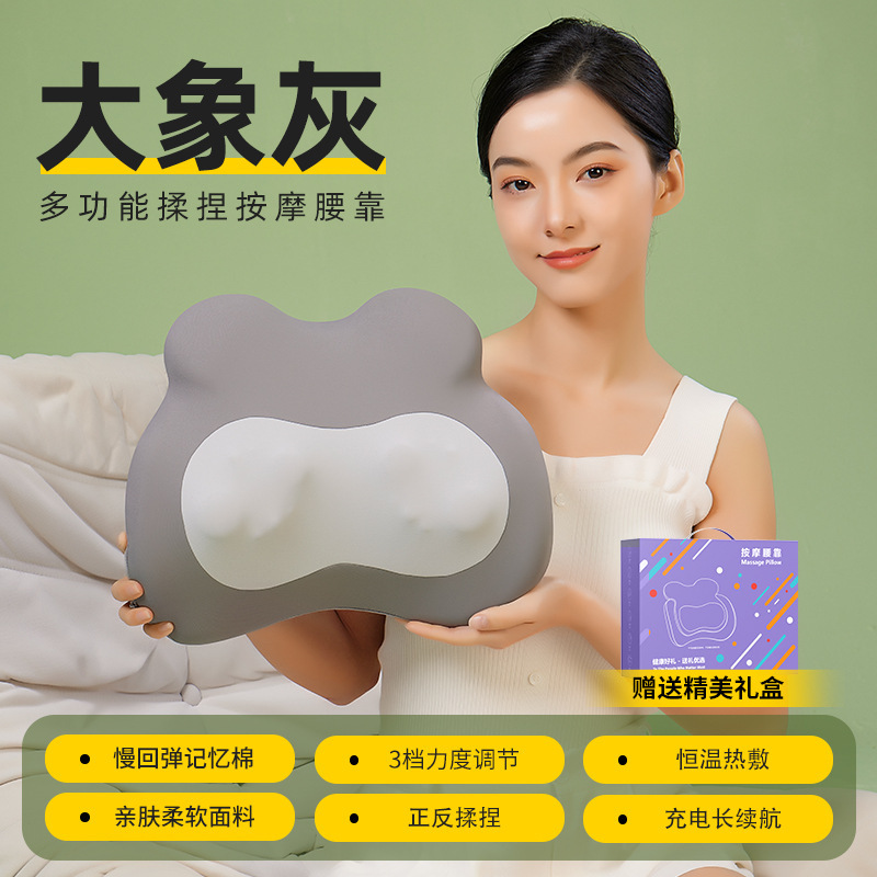 腰のマッサージ器の男性の女性の全身はソファーの背中を加熱して枕をマッサージします。|undefined