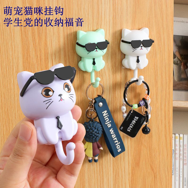 Cartoon cat-shaped adhesive wall hook for hanging heavy items, no-drill required, suitable for bathroom, kitchen, and toilet storage Cartoon cat-shaped adhesive wall hook for hanging heavy items, no-drill required, suitable for bathroom, kitchen, and toilet storage
