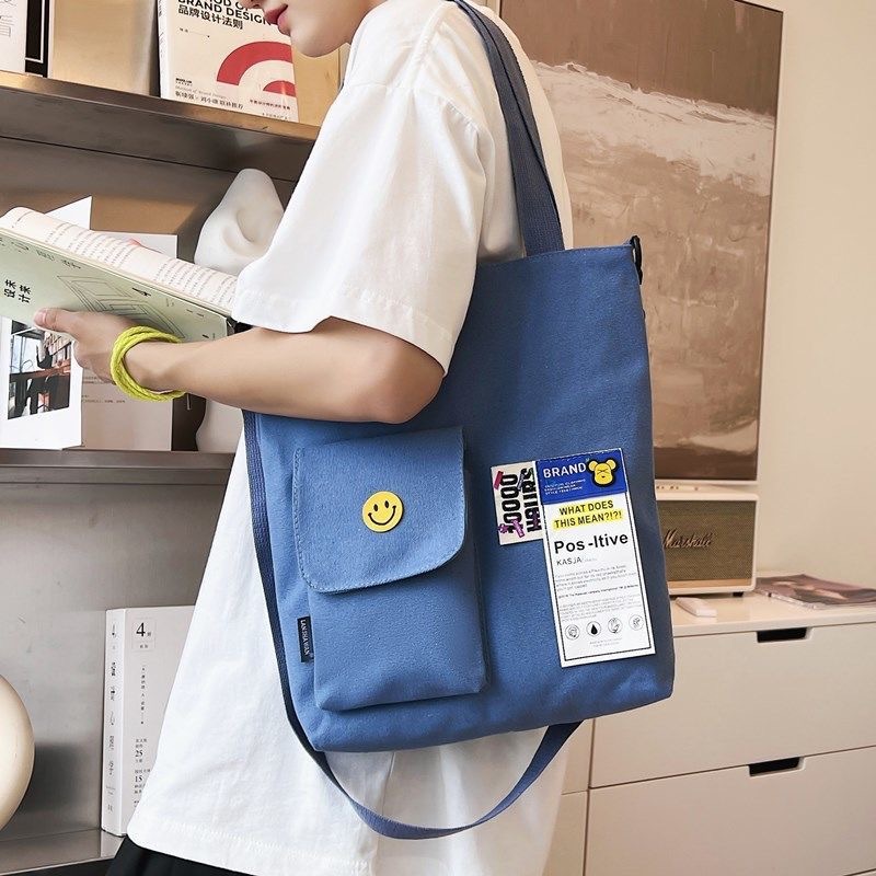 Nuevos hombres y mujeres de estudiante universitario bolsa de lona de moda crossbody bolsa de estilo coreano japonés casual bolsa de hombro de gran capacidad