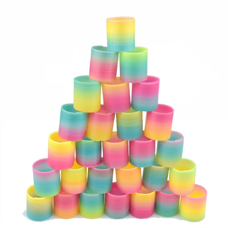 子供の魔力の虹の輪の表情の笑顔の虹のスプリングの輪の露店の弾力の積み重ねの輪の知育のノスタルジックなおもちゃ|undefined