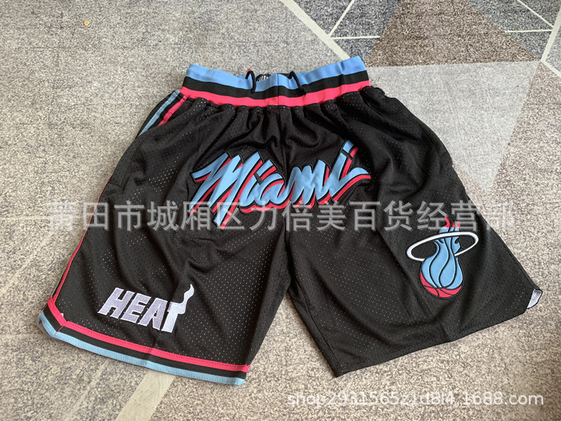 Comercio exterior pantalones de fútbol al por mayor Warriors Lakers 76 caliente Raptor mágico bolsillo bordado pantalones cortos pantalones de baloncesto NFL