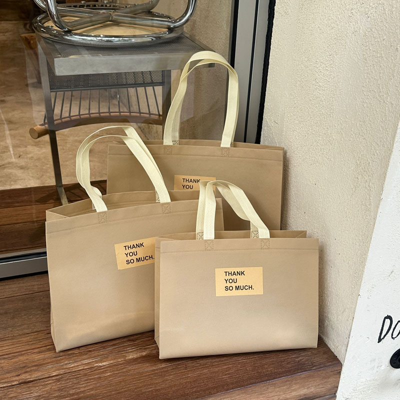 卡其色加宽无纺布手提袋定 制logo服装店购物礼品袋打包购物袋
