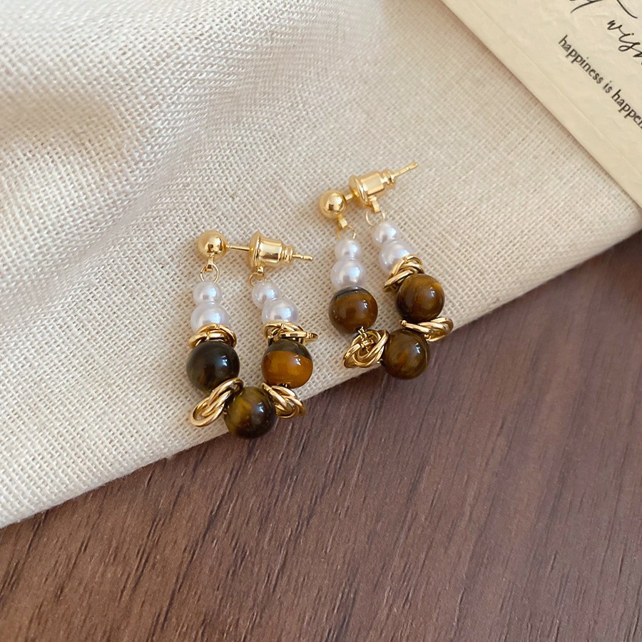 Pendientes de ojo de tigre artificial de color café Maillard con aguja de plata Pendientes simples y de moda de todo fósforo Pendientes ligeros de lujo de alta gama