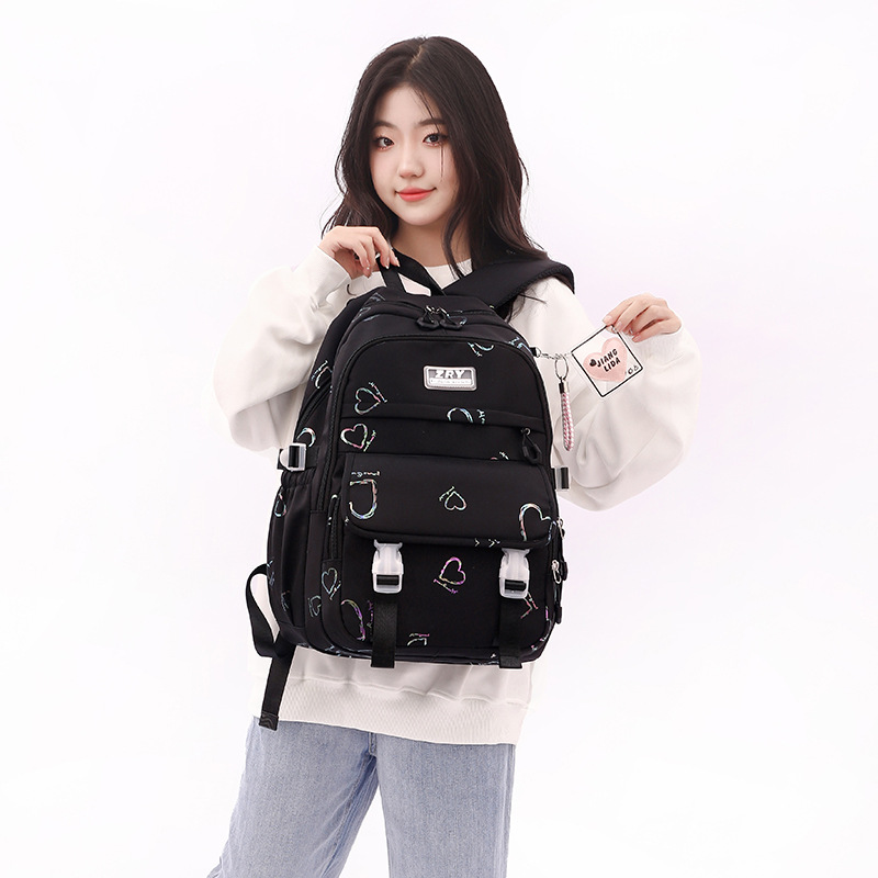 Mochila de nylon ligera de estudiante de escuela primaria de invierno para niñas transfronterizas mochila de estudiante de secundaria al por mayor entrega de una pieza