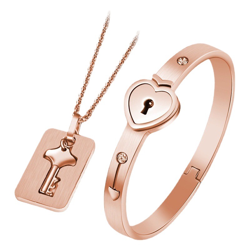 Pulsera de pareja creativa transfronteriza, cerradura de corazón, cerradura de amor, pulsera de acero de titanio, conjunto de llaves al por mayor