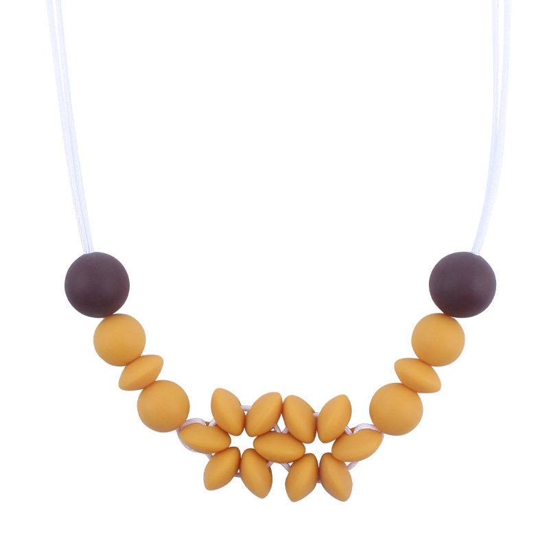 Suministros de bebé collar de flores de dibujos animados bebé creativo cuentas de silicona mordedura molar COLLAR COLGANTE hecho a mano