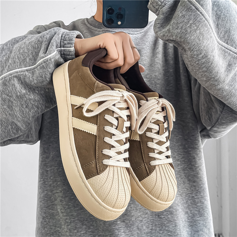 Zapatos de hombre retro Gump casual versátil conchas de cabeza de skate juveniles otoño nuevo tipo de zapatos de entrenamiento alemán de suela suave para hombres