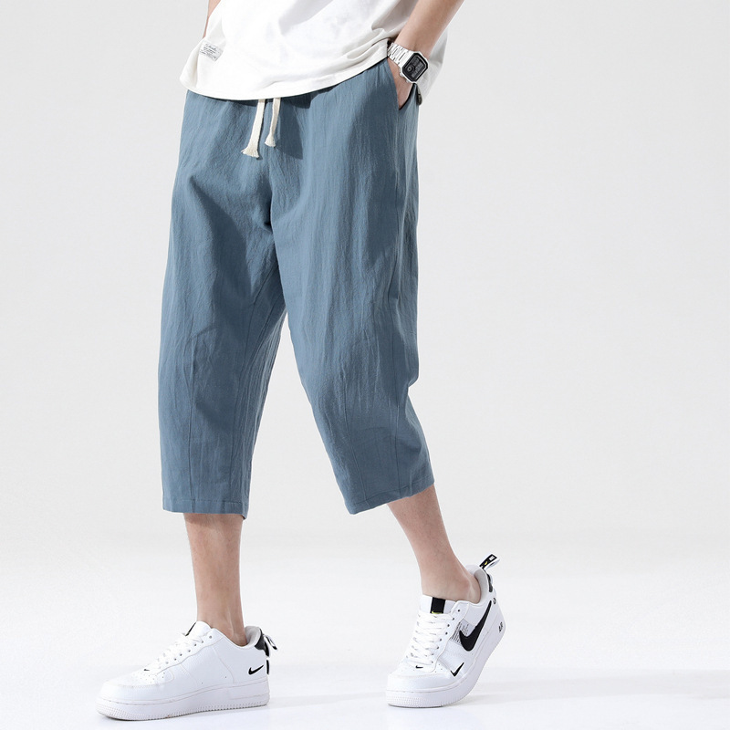 Pantalones recortados pantalones casuales de los hombres de moda verano de los hombres delgados sueltos versión coreana de los hombres de algodón y lino de gran tamaño al por mayor
