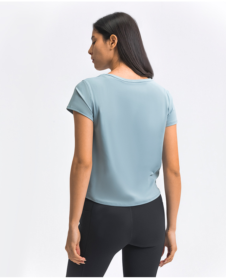 top suelto de yoga de color sólido de manga corta y cuello redondo de alta elasticidad NSDQF127266