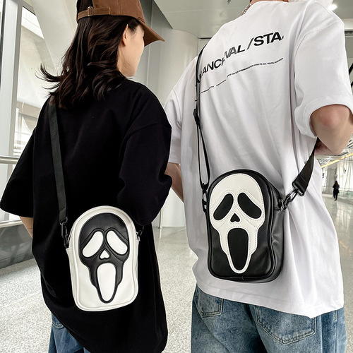 Crossbody bag for men and women, Korean style niche trend, funny ghost skull crossbody shoulder bag, soft PU mobile phone small shoulder bag
