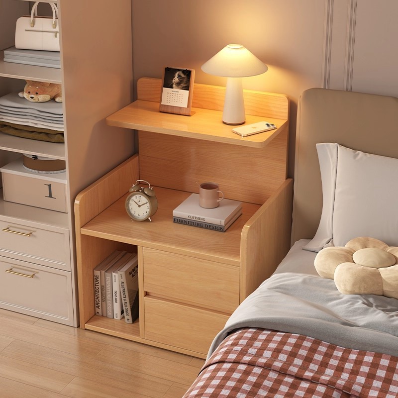 Mesa de cabecera doméstica dormitorio pequeño almacenamiento creativo pequeño gabinete simple estante de cama multifuncional 2026 venta caliente