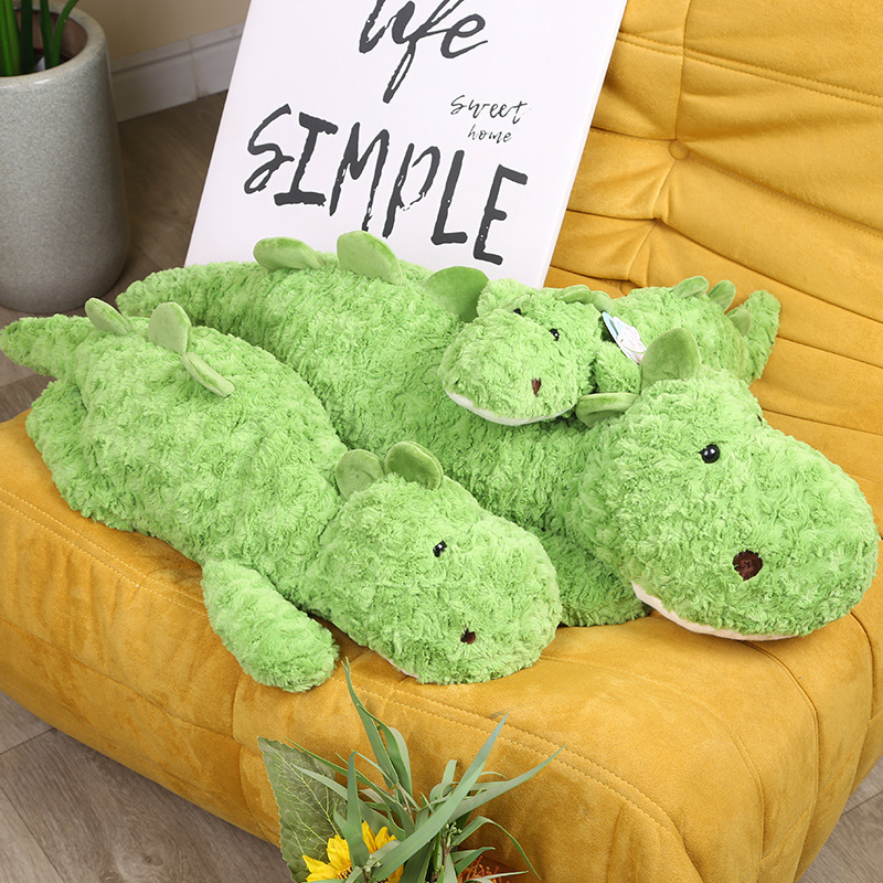 Mochila transfronteriza de aguacate, muñeca de dinosaurio, cama para niños, almohada, peluche, niña, muñeca para dormir, dragón de flores cepillado
