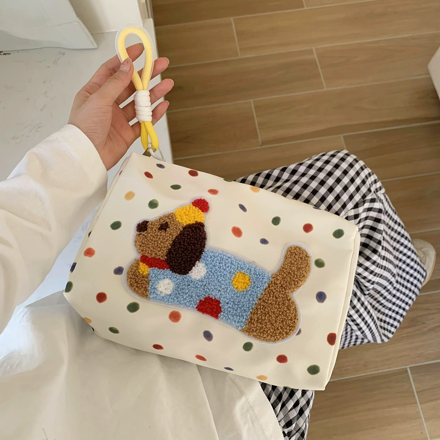 Capacious cosmetic bag, storage system, handheld shoulder bag, organizer bag for traveling