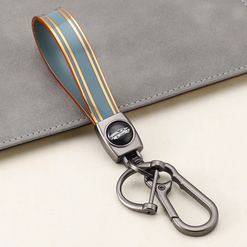 Cuerda de mano de silicona transfronteriza llavero de coche logotipo de coche apellido llavero anti-pérdida llavero de cuerda de mano de silicona duradera