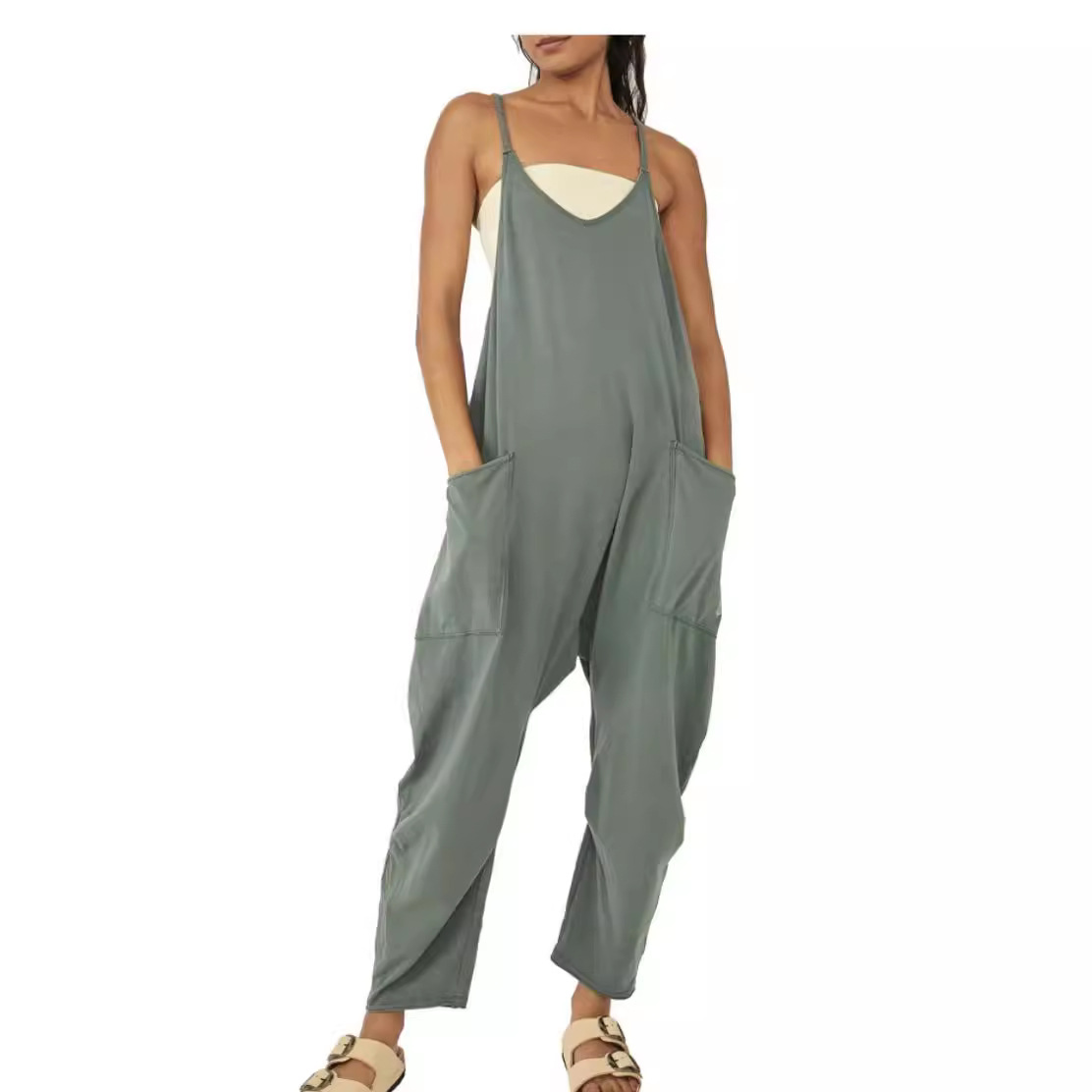 2022 Nueva estación independiente europea y americana transfronteriza Sling de mujer con cuello en V mono color sólido bolsillo suelto pantalones recortados