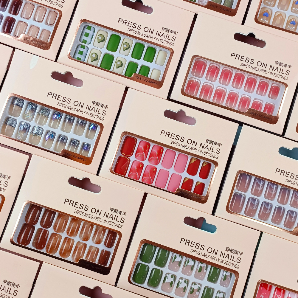 Embalaje de características más vendidas personalizado para usar uñas para dibujar dibujos de diseño de uñas parches de uñas falsas desmontables