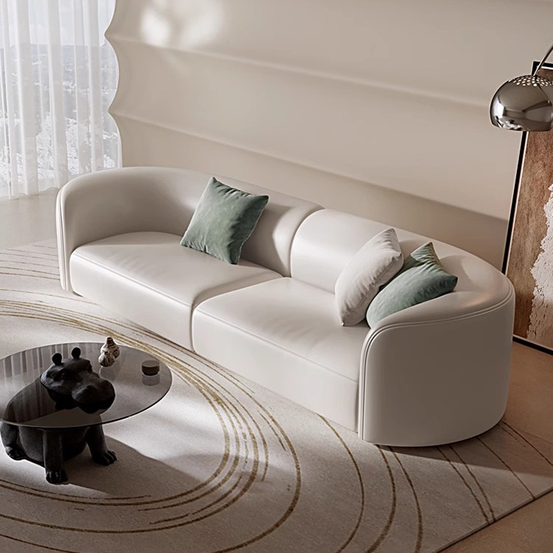 Arena de cuero real moderna simple sofá de sala de estar semi-circular pequeño tipo de casa de alta gama diseñador de viento crema sofá curvo