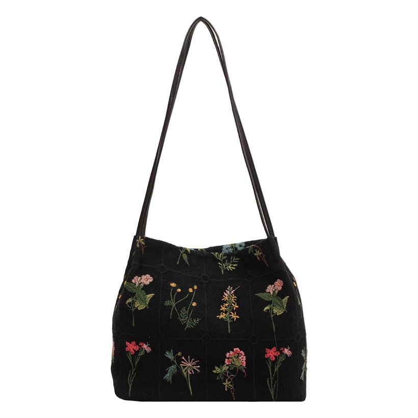 Bolso de mano bordado de gran capacidad para las mujeres 2024 primavera y verano nuevo nicho lienzo bordado bolso de cubo de cercanías