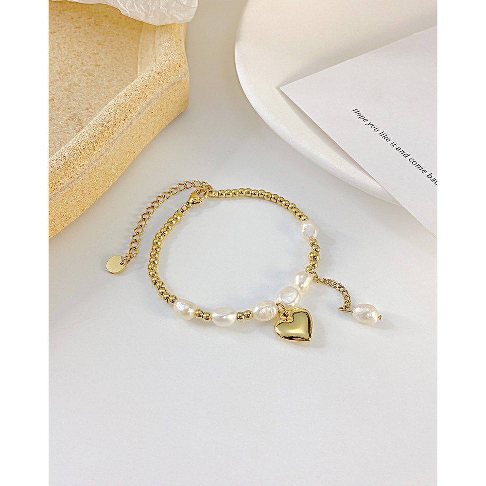 Nouveau Bracelet En Acier Inoxydable Avec Perles D&#39;eau Douce Et Coutures De Coeurs De Pêche Rétro En Gros display picture 3