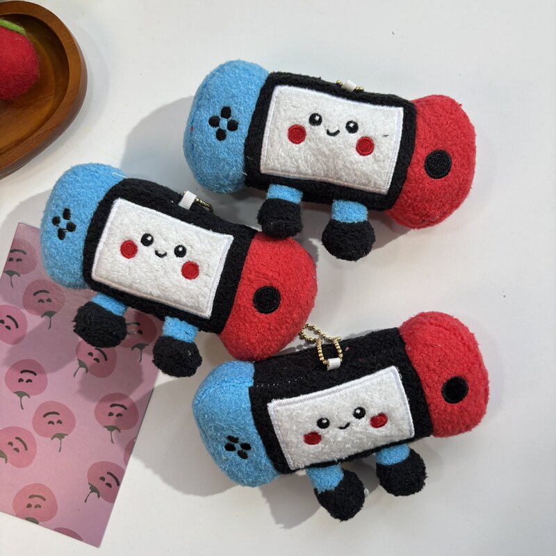 かわいいクリエイティブゲームコンソール赤と青のレトロなぬいぐるみクリエイティブバッグキーホルダー人形ゲームシティグラブマシン人形|undefined