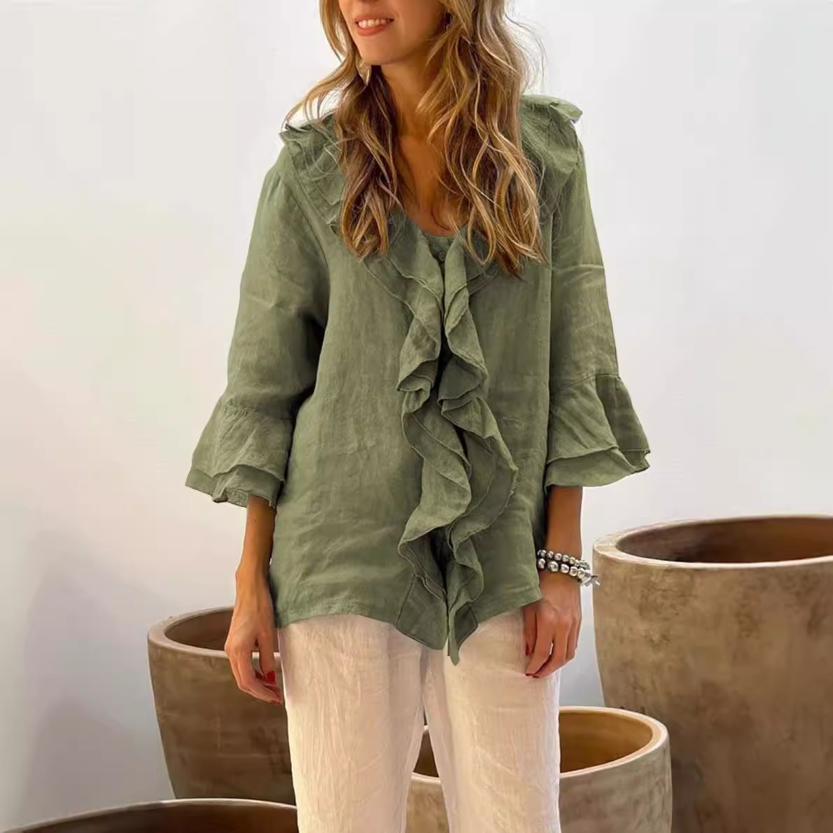 2024 estilo europeo y americano transfronterizo otoño color sólido nueva moda con cuello en V mangas voladoras con volantes suelta casual top mujer