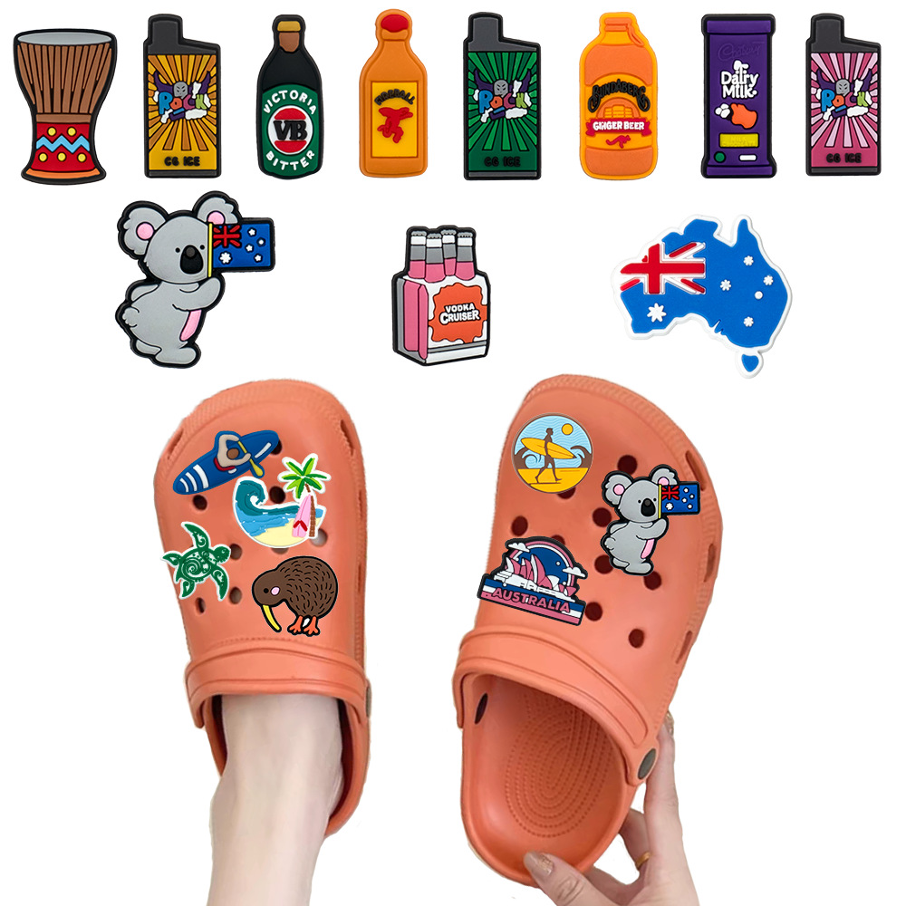 国境を越えたアニメオーストラリアの靴の花の靴は穴の靴の装飾のボタンの部品を掛けます。