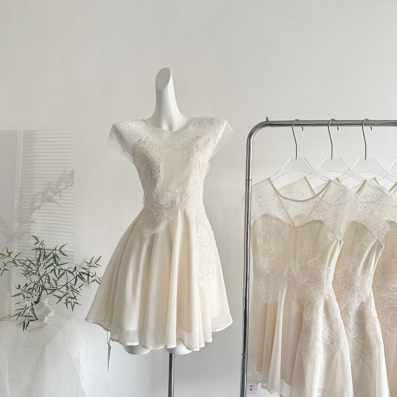 Temperamentally Spicy and Elegant, the Moonlight Gentle and Graceful Milk Apricot Lace Splicing Chiffon Dress 2026 for Petite Sizes