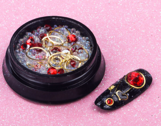 Joyas de belleza de uñas de la estrella y la luna, remaches de estampado de oro, bolas de acero mezcladas con anillo de metal, diamante de agua, diafragma de aleación hueca japonesa