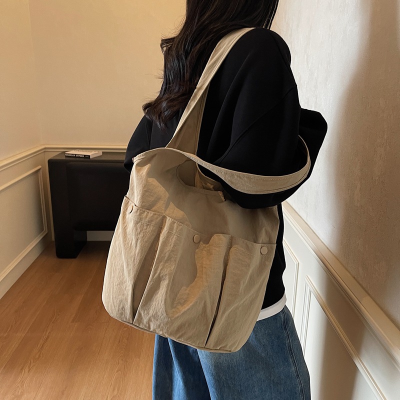 Sac seau décontracté, léger et simple, à poches multiples, grande capacité, style coréen, polyvalent, à porter à l'épaule, idéal pour les étudiants et les cours._voghion.com