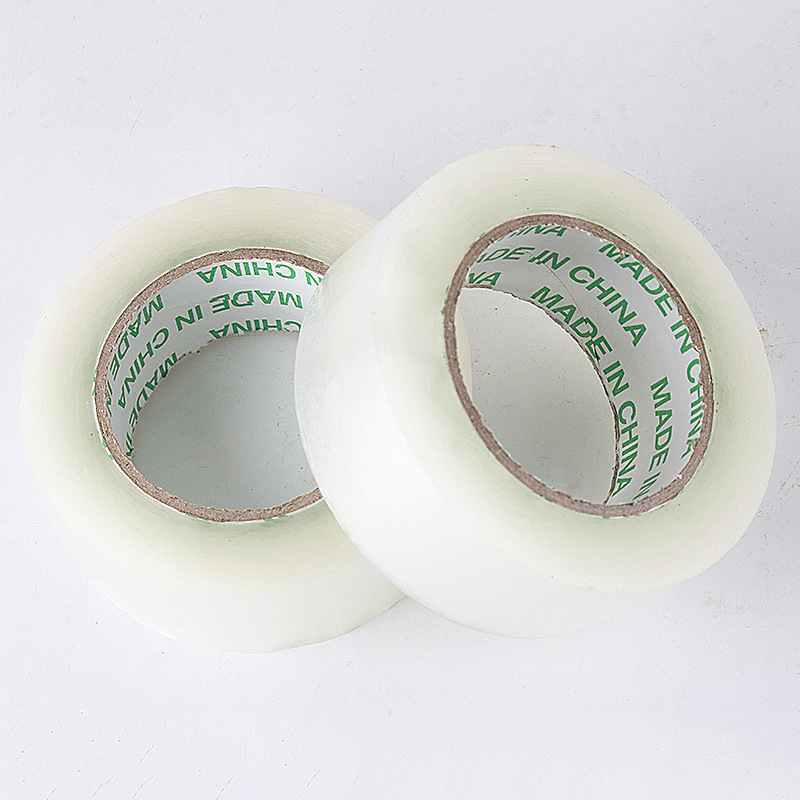 Cinta adhesiva cinta adhesiva de sellado de rollo grande transparente cinta adhesiva de embalaje al por mayor personalizada sobre fondo blanco letra roja papel adhesivo expreso especial de comercio electrónico