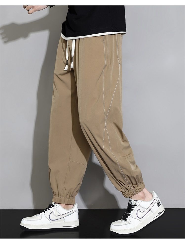Quần jogger nam bo gấu dài ống bó, chất liệu băng lụa mỏng mùa hè, form rộng thùng thình, phong cách thể thao, nhiều size từ M đến 8XL — màu đen, màu xám đậm, màu kaki chi tiết 18