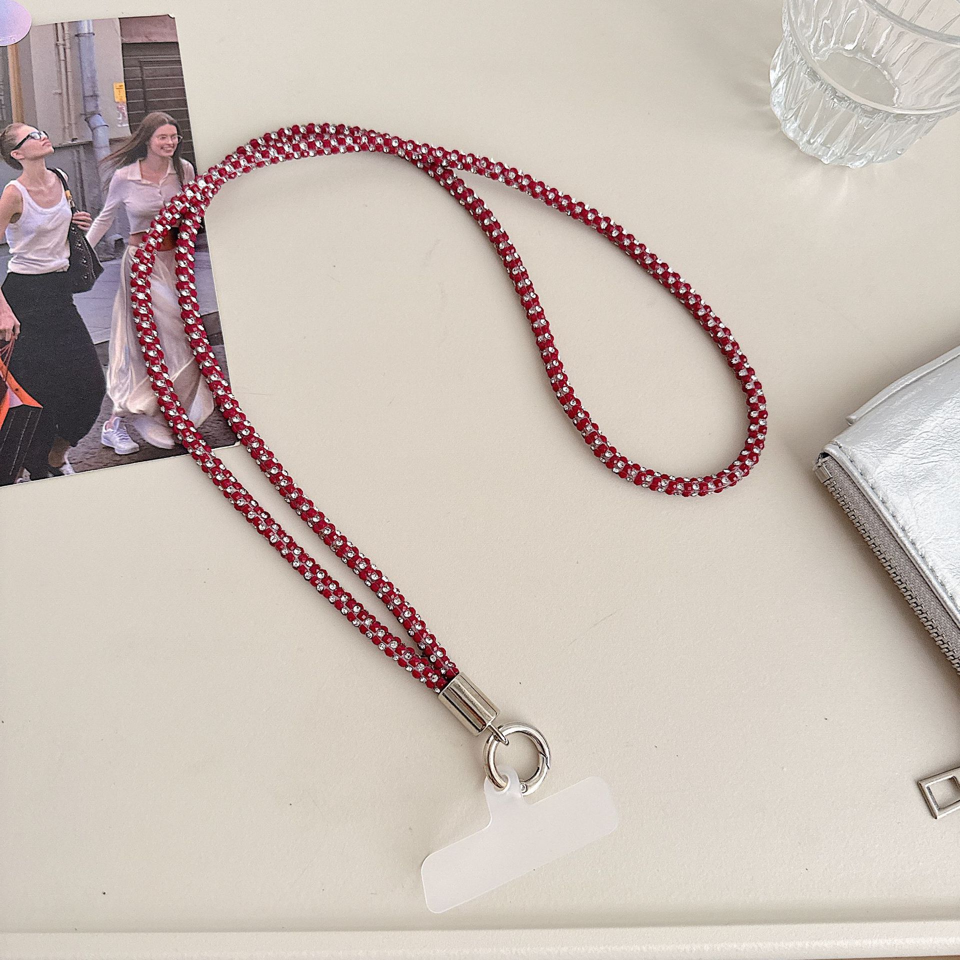 Cadena colgante de teléfono móvil de alta gama hecha a mano de boutique, sensación femenina de alta gama, lujo ligero, cadena colgante de diamante completo, cadena colgante de teléfono móvil de moda, sección larga y corta