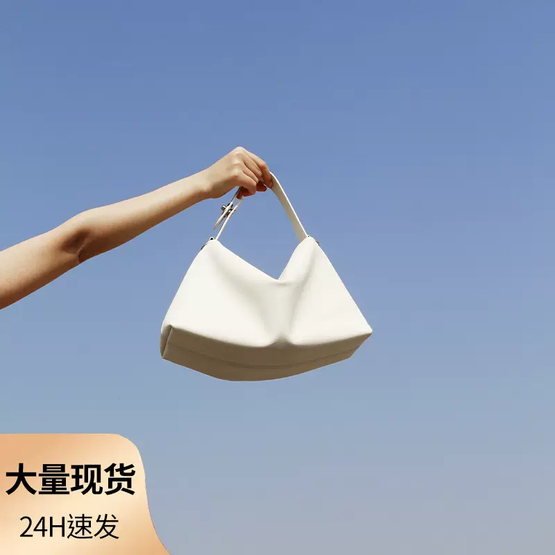 头层牛皮单肩包春季新款大容量真皮女化妆包纯色极简风质感手提包