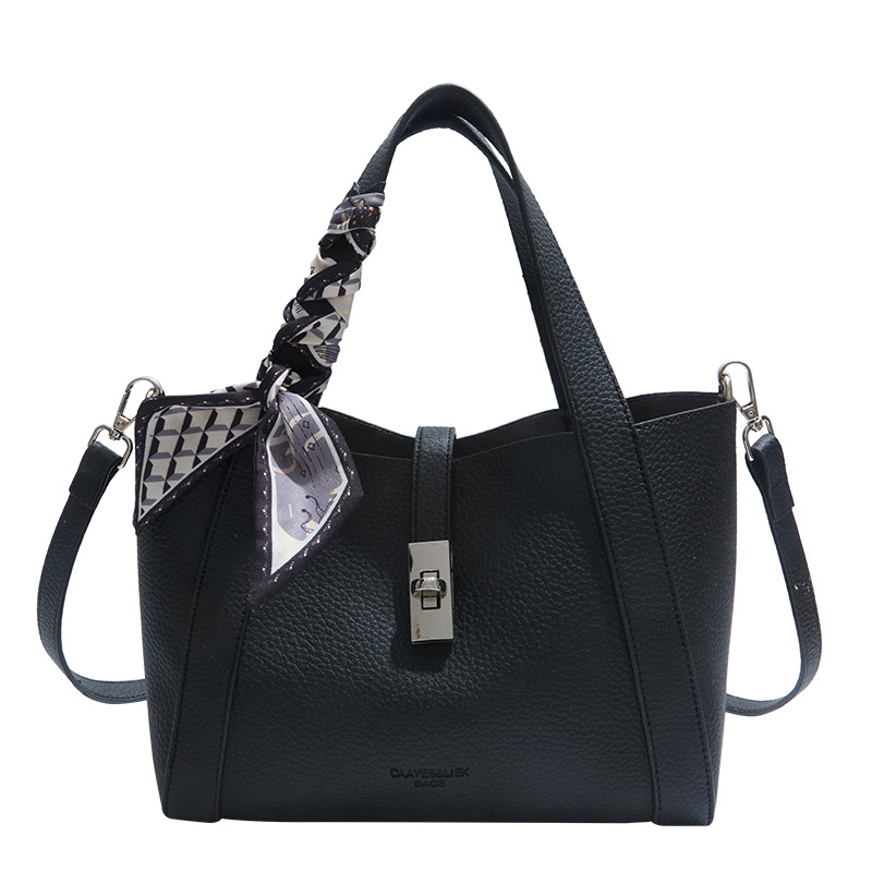 Bolso de mano de textura de alta calidad para mujer 2025 nuevo estilo nicho bolso de cubo de un solo hombro mensajero cesta de verduras bolso de viaje